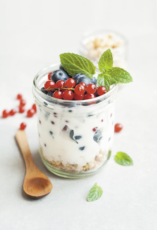 Creamy homemade yogurt in a bowl with berries